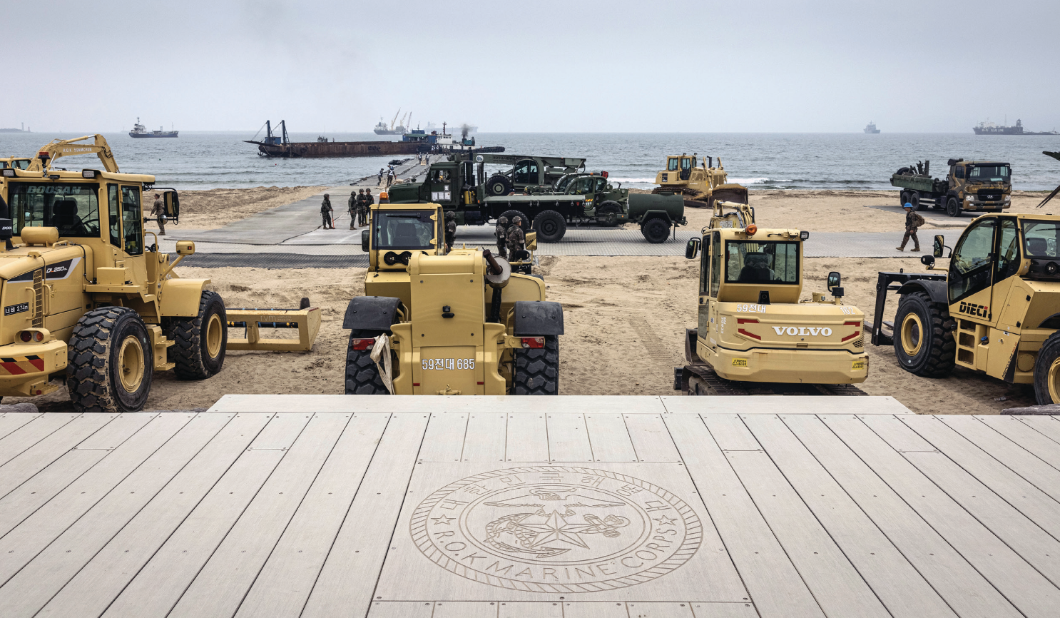 Marines with 3rd Landing Support Battalion ground-guide Medium Tactical Vehicle Replacement at Pohang, South Korea, June 12, 2023, as partof Combined Distribution Exercise 23 (U.S. Marine Corps/Danny Gonzalez)
